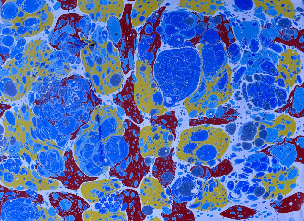 Marbled paper with a veined stone pattern